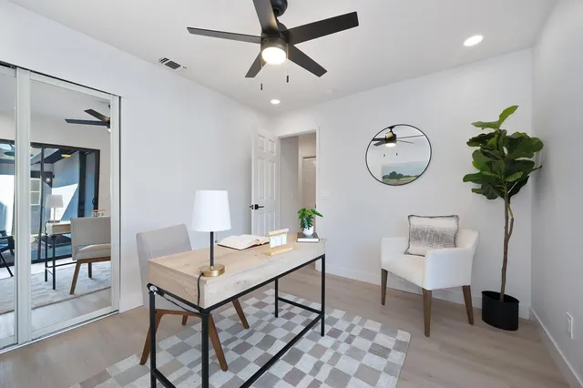 a bathroom with a toilet sink and shower