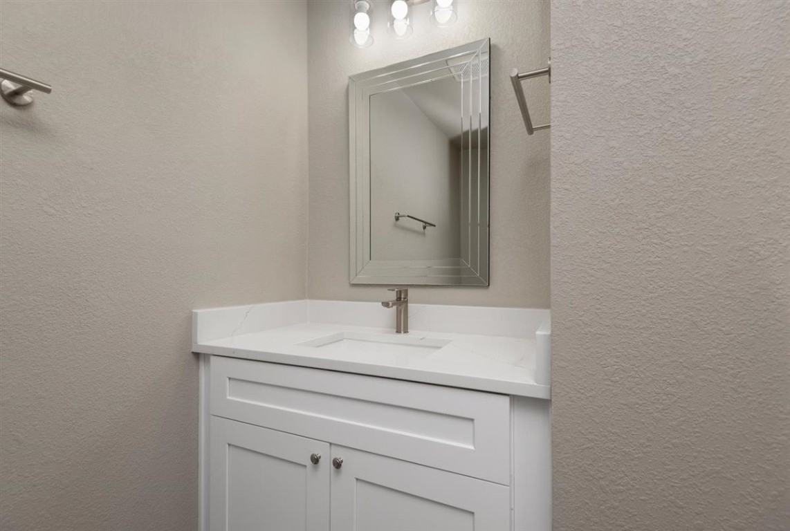 20618 Nannette Lane Spring, TX 77388 - Photo 18 of 32 a close view of a sink and mirror in a bathroom