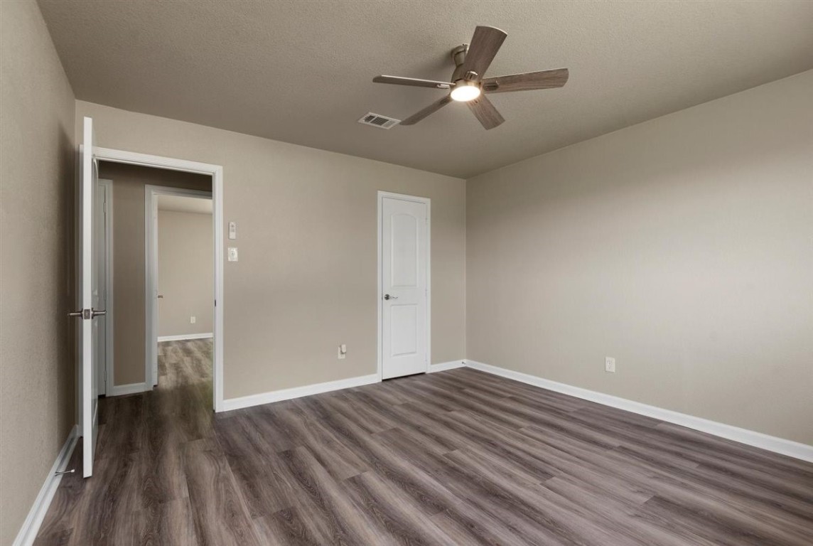 20618 Nannette Lane Spring, TX 77388 - Photo 20 of 32 wooden floor in an empty room