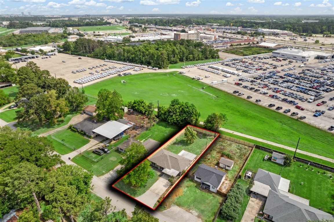 20618 Nannette Lane Spring, TX 77388 - Photo 25 of 32 an aerial view of a residential houses with outdoor space and river