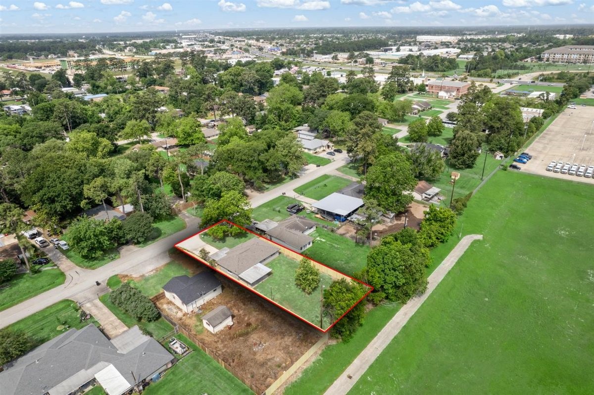 20618 Nannette Lane Spring, TX 77388 - Photo 29 of 32 an aerial view of residential houses with outdoor space and trees
