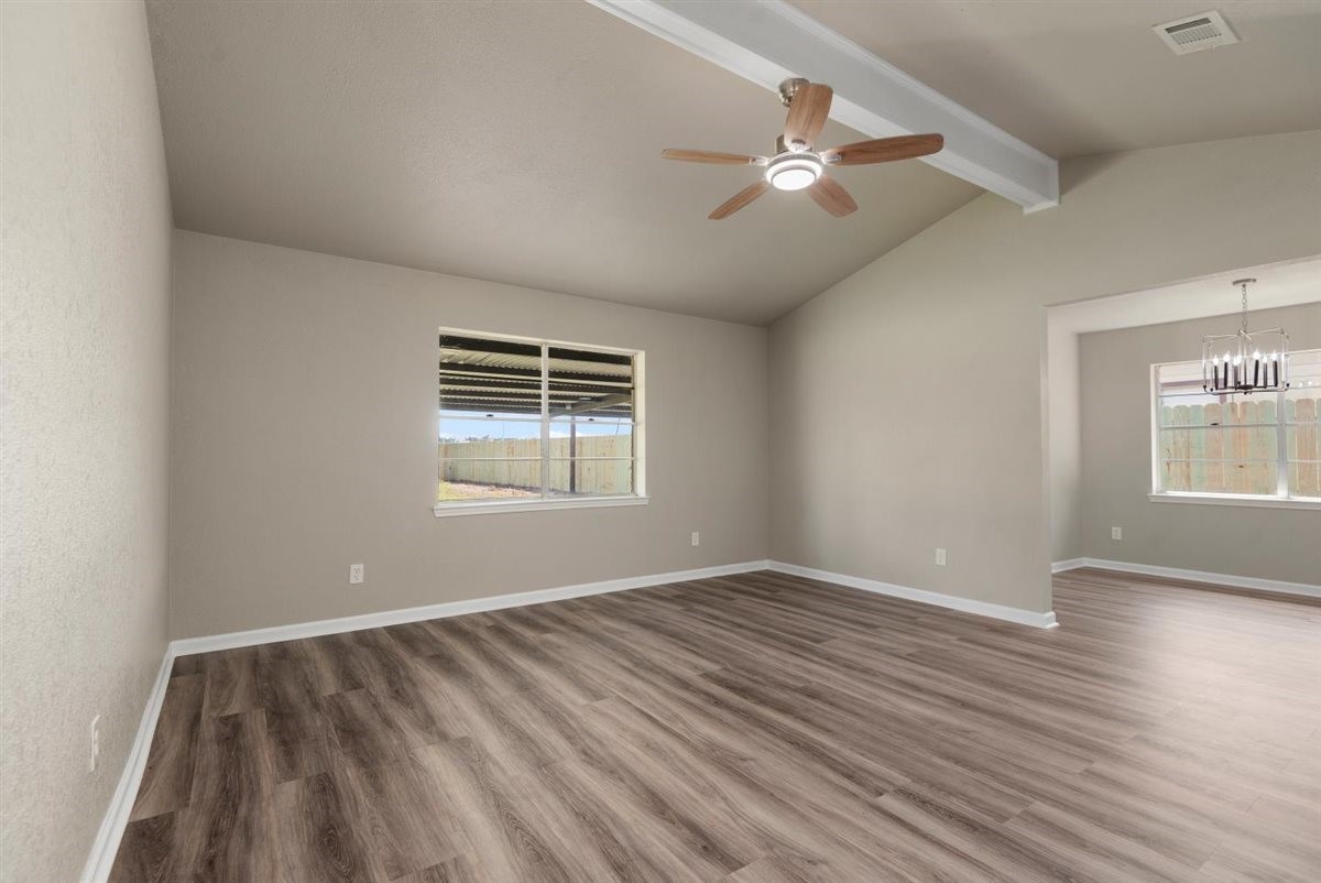 20618 Nannette Lane Spring, TX 77388 - Photo 6 of 32 wooden floor in an empty room with a window