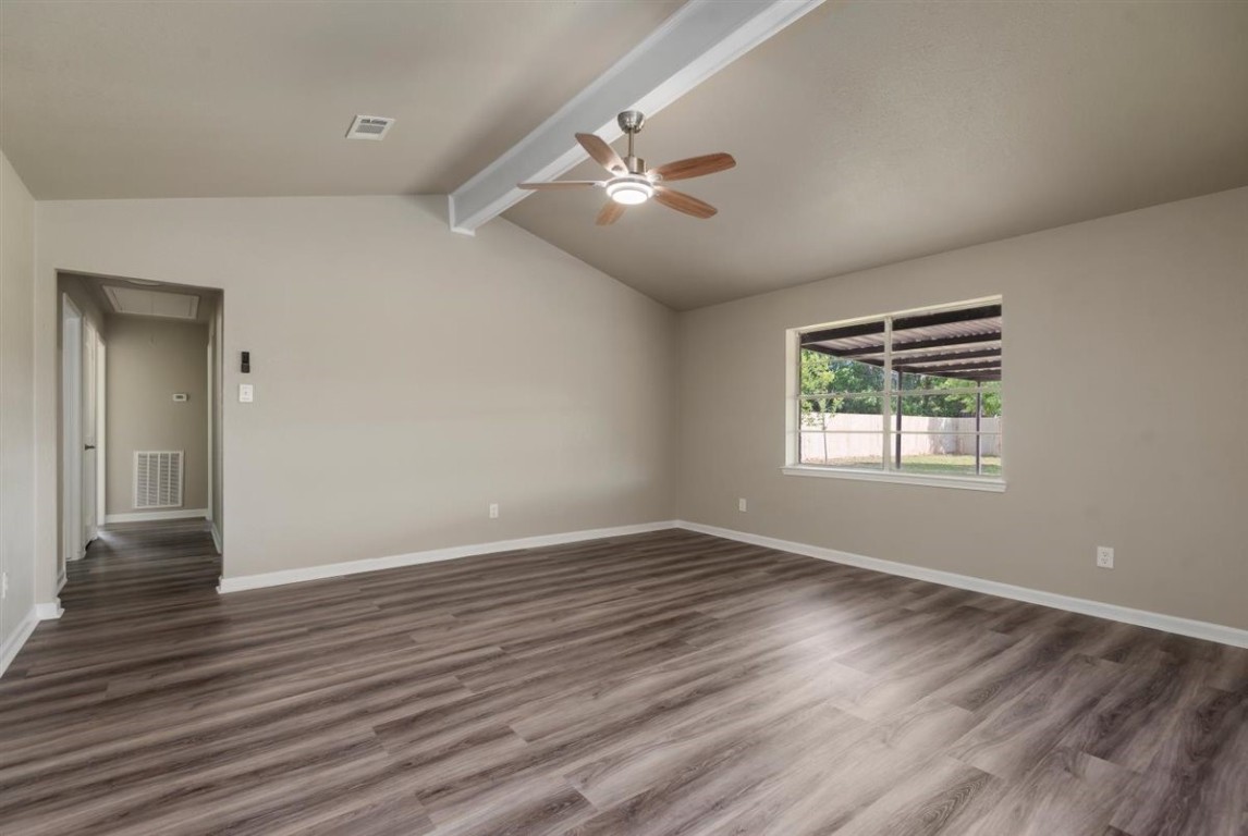 20618 Nannette Lane Spring, TX 77388 - Photo 8 of 32 a view of an empty room with wooden floor and a window