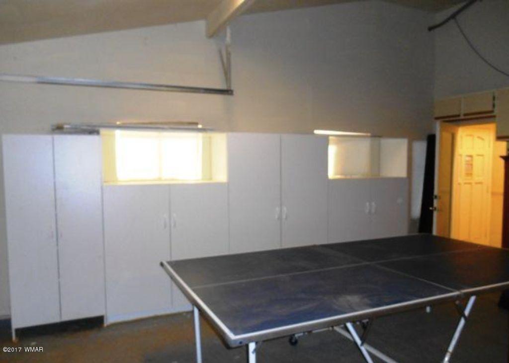 3410 Beaufeaux Road Overgaard, AZ 85933 - Photo 25 of 32 a view of an empty room and window