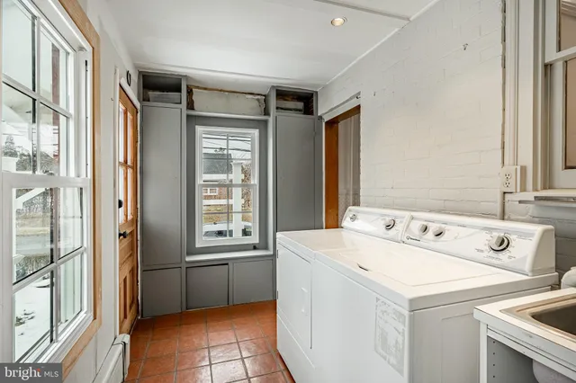 a utility room with dryer and washer
