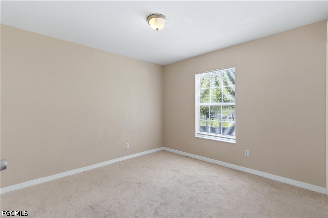 5257 Leeds Road Fort Myers, FL 33907 - Photo 17 of 30 an empty room with a window