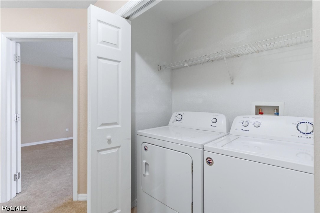 5257 Leeds Road Fort Myers, FL 33907 - Photo 23 of 30 a view of storage and utility room with washer and dryer