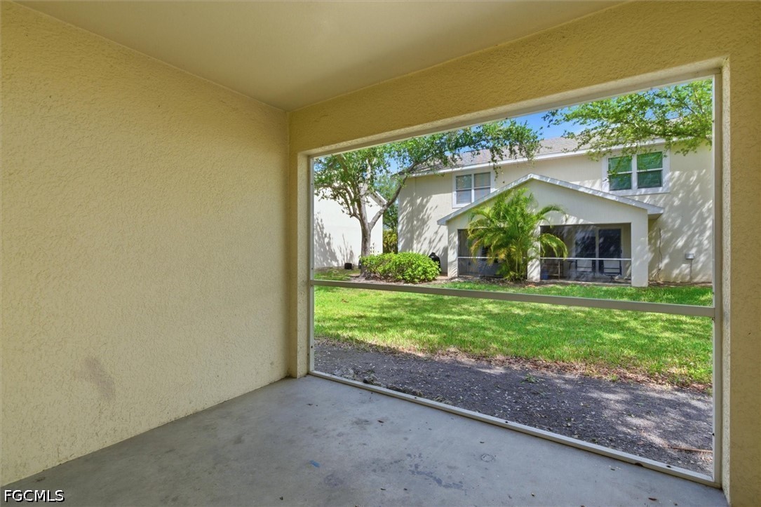 5257 Leeds Road Fort Myers, FL 33907 - Photo 25 of 30 a view of a house with backyard and garden