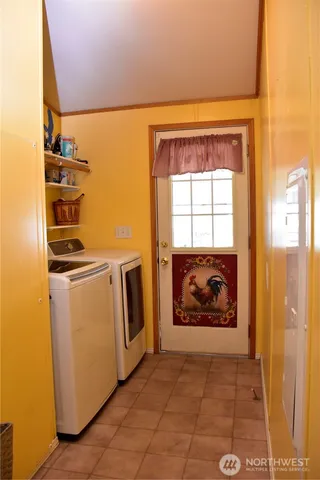 a kitchen with a stove and a refrigerator
