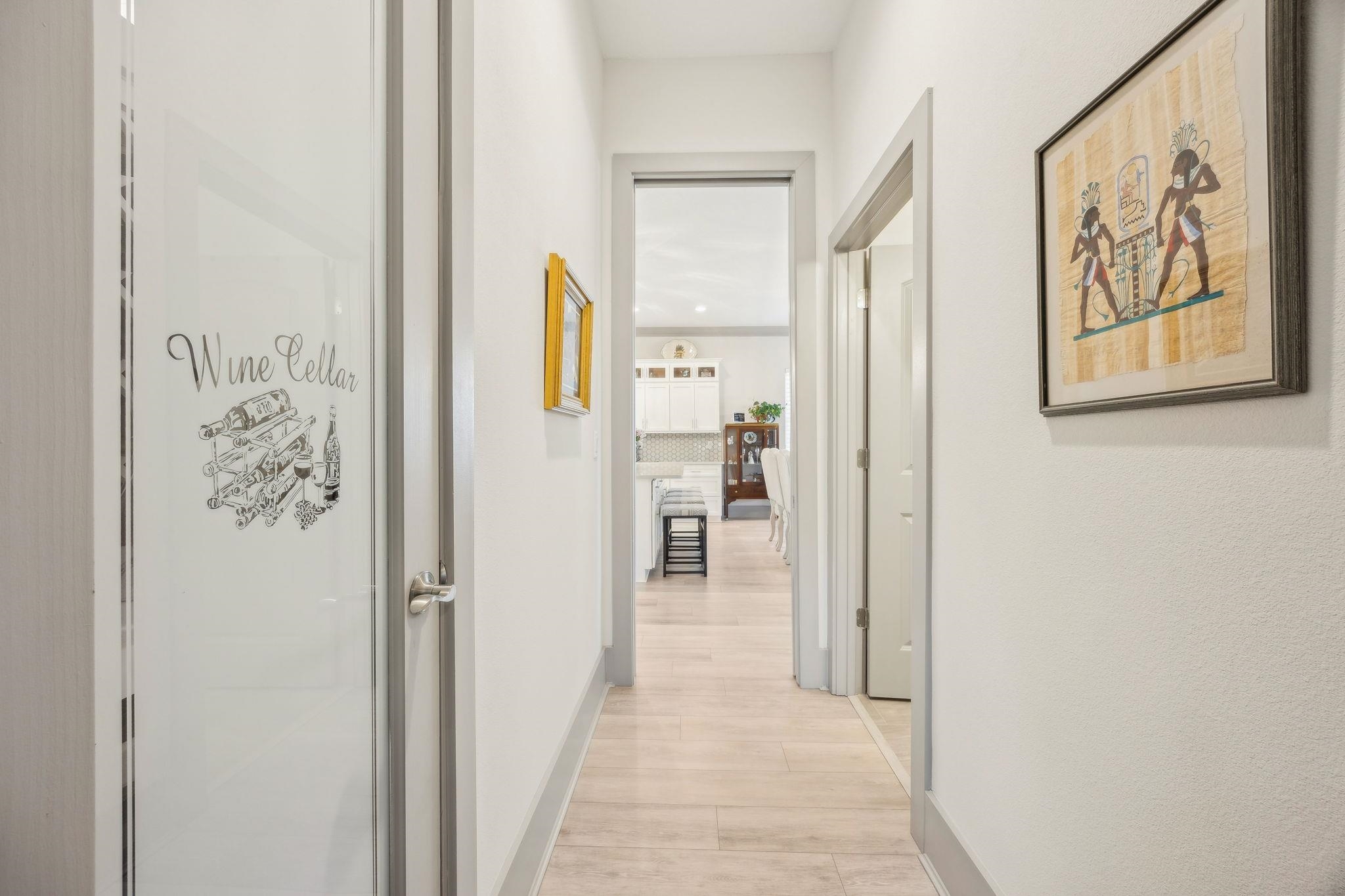 18 Rio Vista Drive Palm Coast, FL 32137 - Photo 16 of 73 a view of a hallway with wooden floor and a dining room