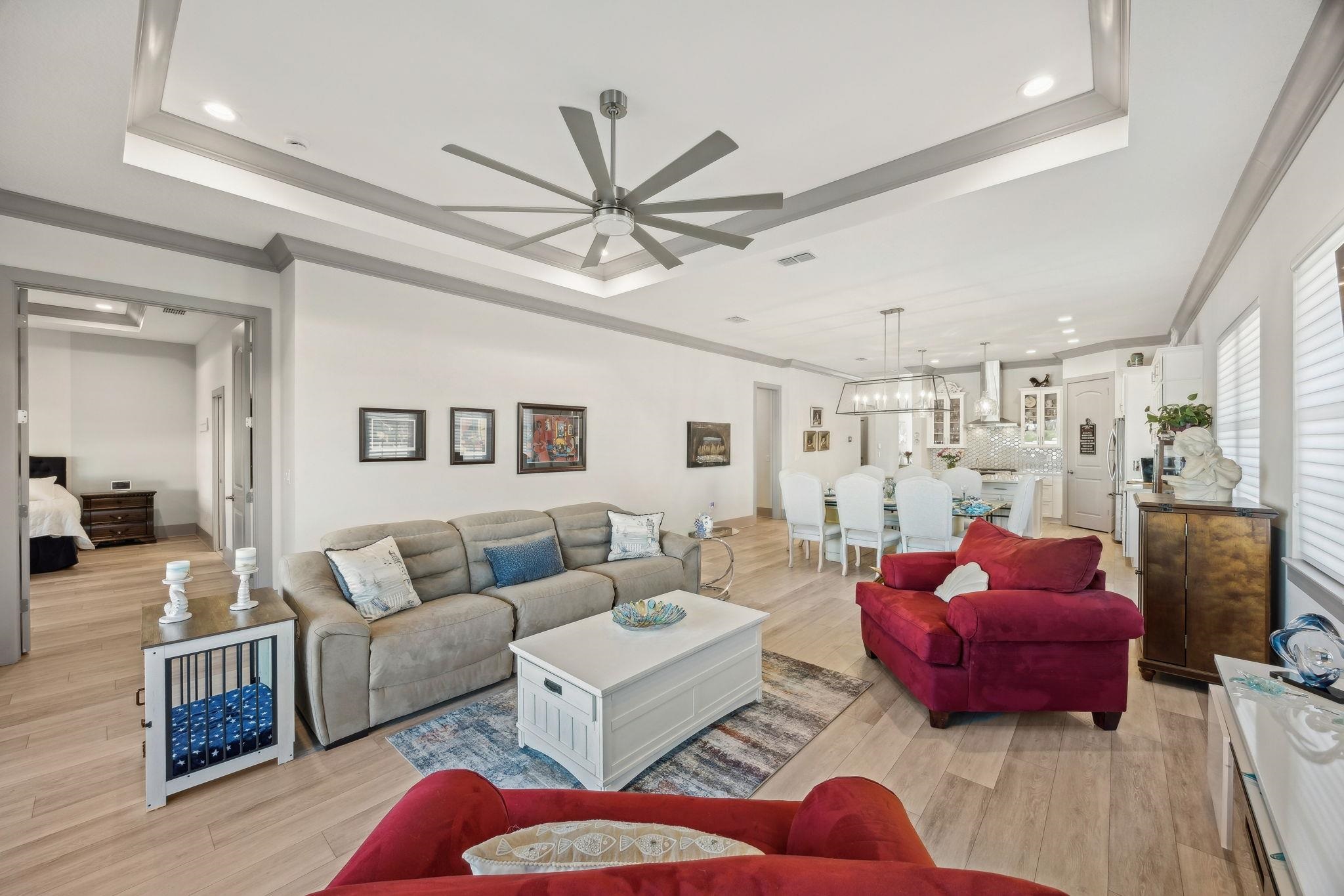 18 Rio Vista Drive Palm Coast, FL 32137 - Photo 23 of 73 a living room with furniture a rug and a chandelier