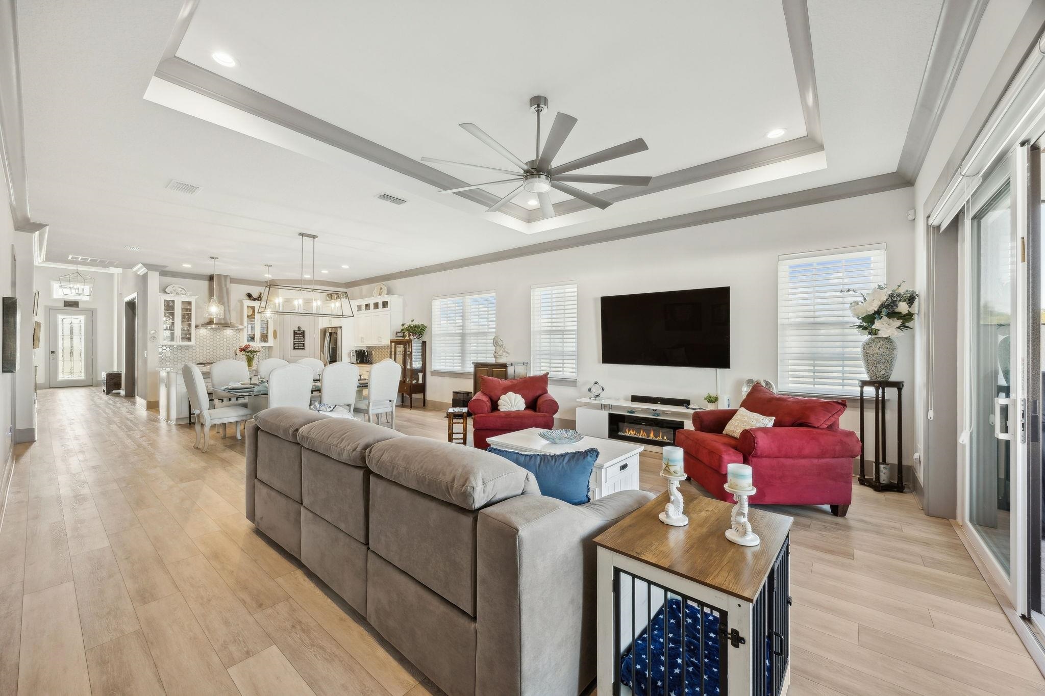 18 Rio Vista Drive Palm Coast, FL 32137 - Photo 24 of 73 a living room with furniture and a flat screen tv