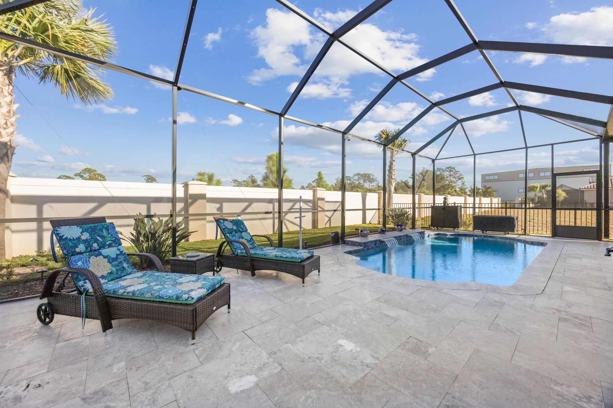 18 Rio Vista Drive Palm Coast, FL 32137 - Photo 31 of 73 a building outdoor space with patio furniture and potted plants