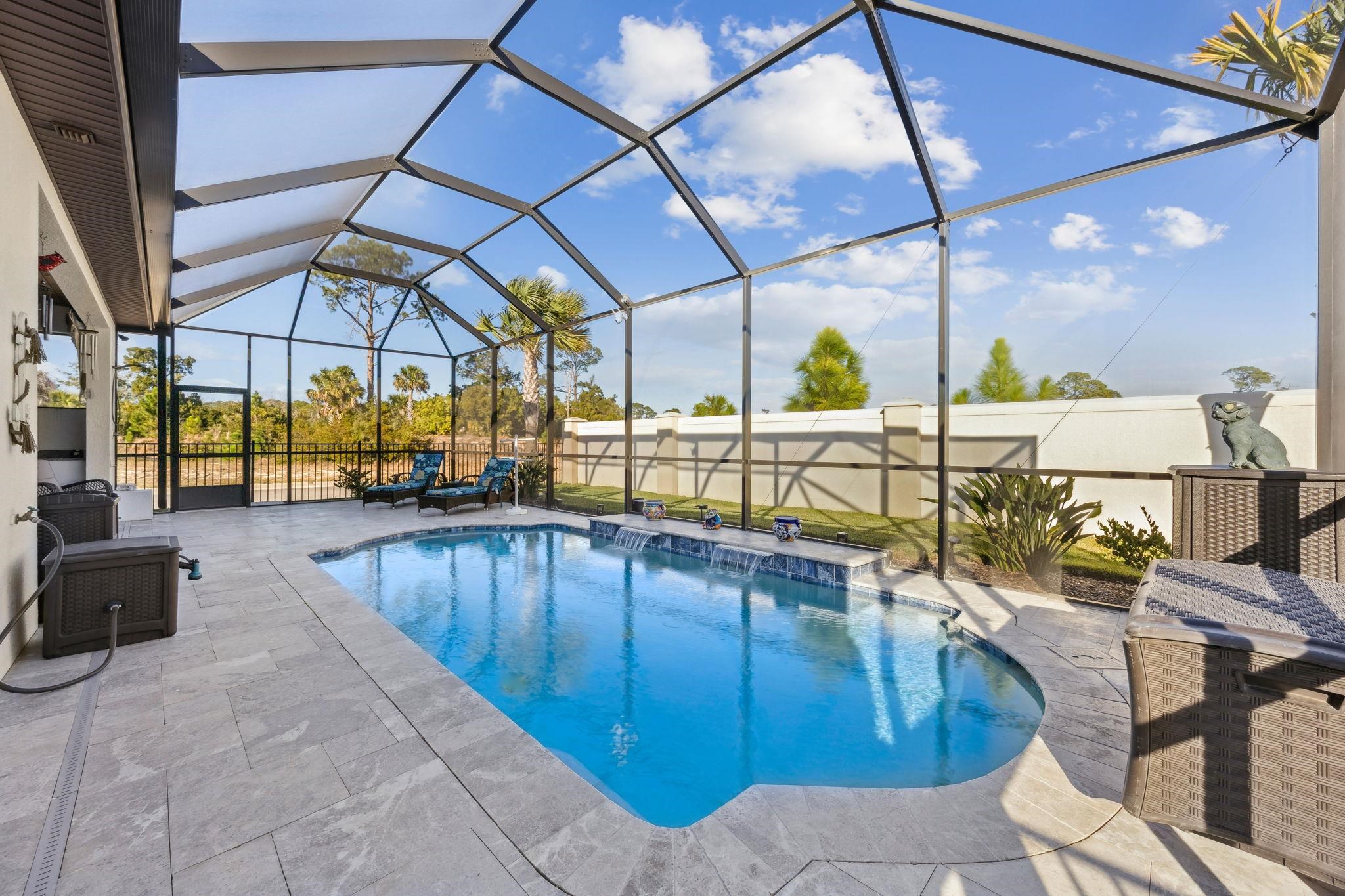 18 Rio Vista Drive Palm Coast, FL 32137 - Photo 32 of 73 a view of a swimming pool with a patio