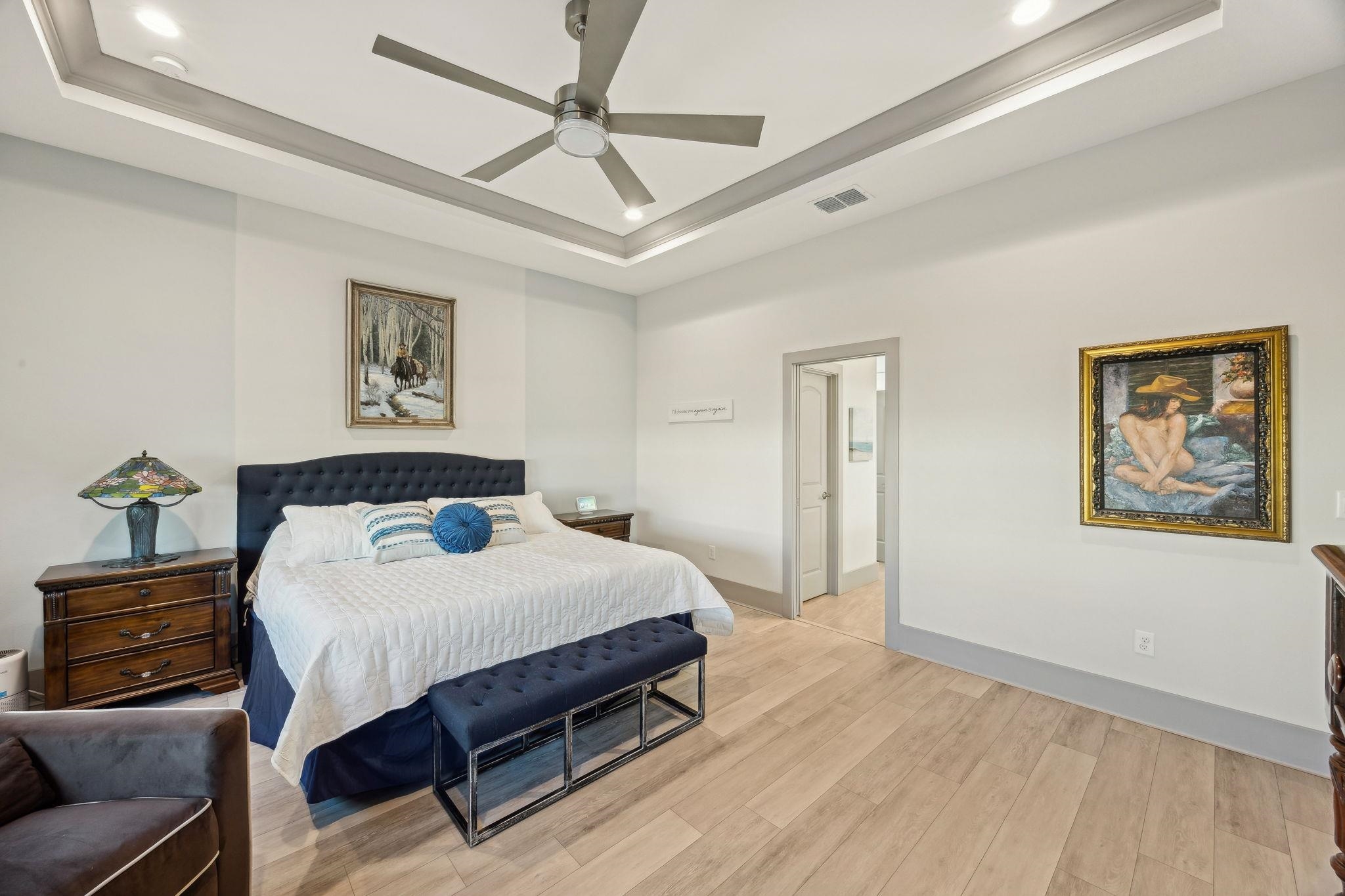 18 Rio Vista Drive Palm Coast, FL 32137 - Photo 39 of 73 a bedroom with a bed and a chandelier