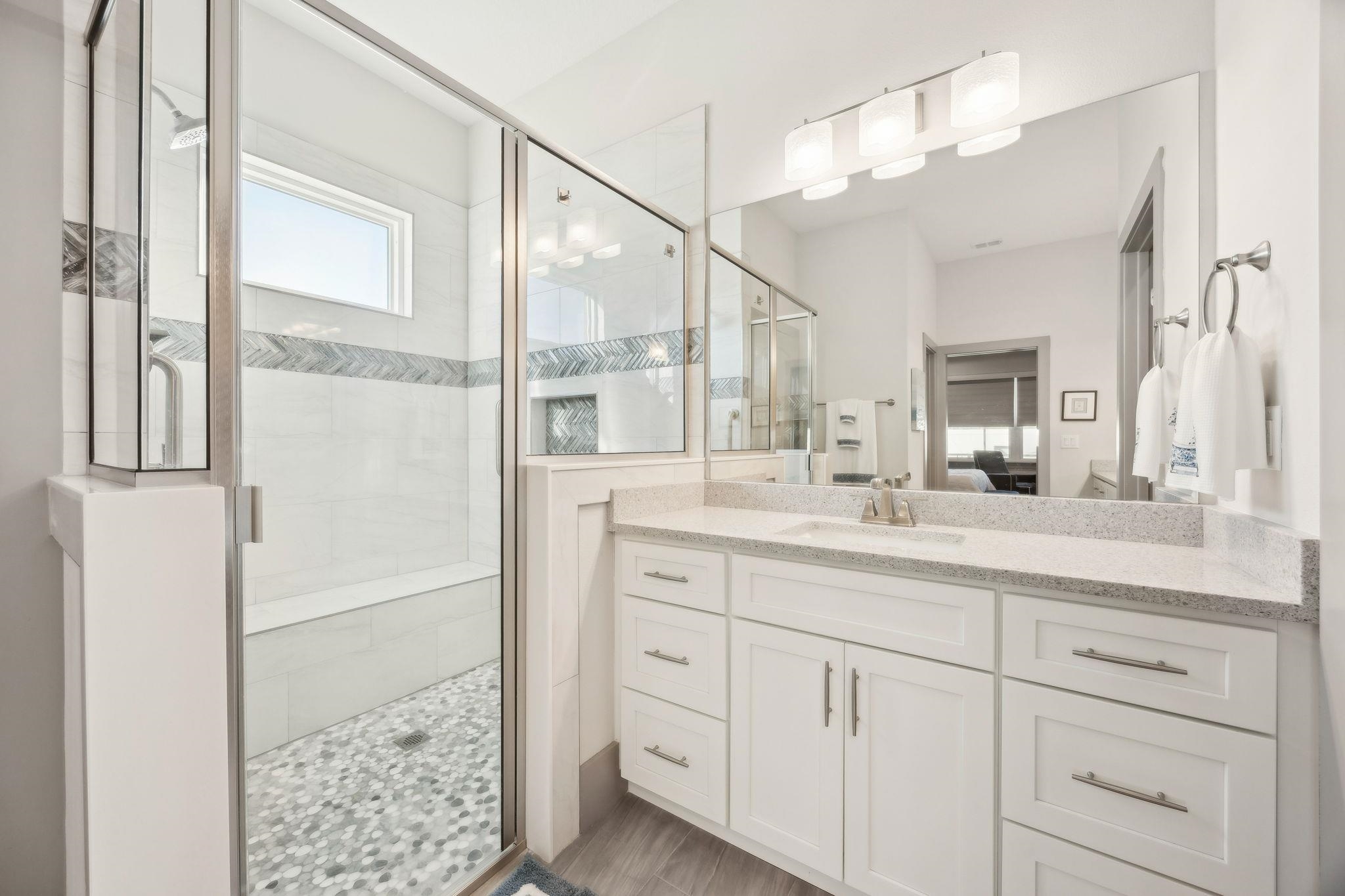 18 Rio Vista Drive Palm Coast, FL 32137 - Photo 41 of 73 a bathroom with a shower sink and mirror