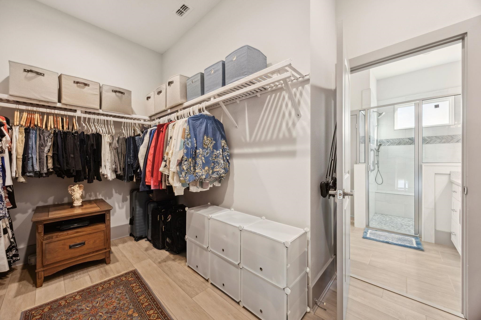 18 Rio Vista Drive Palm Coast, FL 32137 - Photo 42 of 73 a view of walk in closet with clothes and shoes