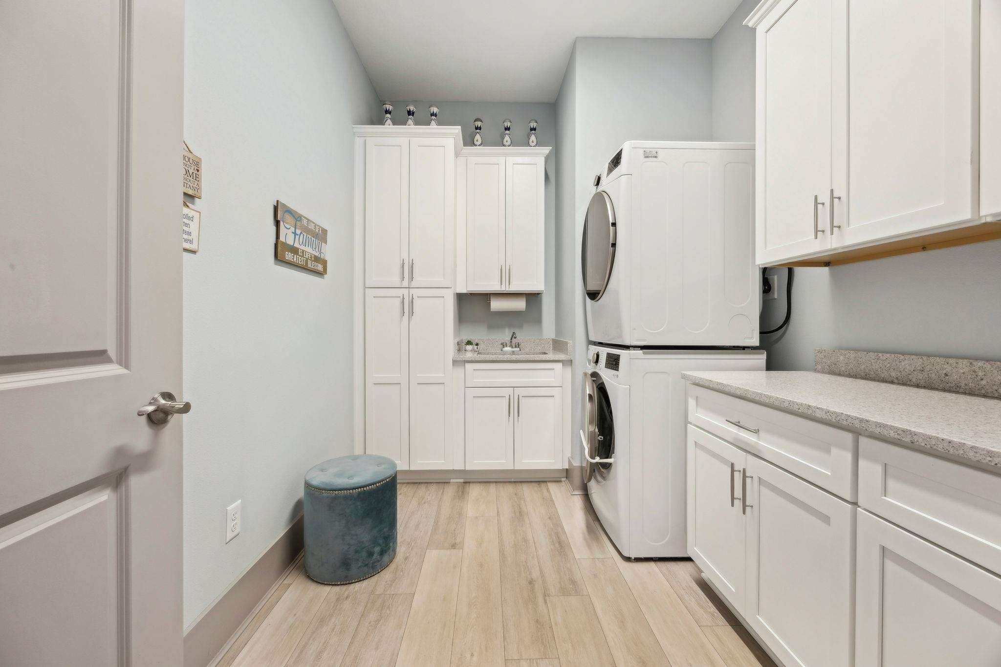 18 Rio Vista Drive Palm Coast, FL 32137 - Photo 50 of 73 a kitchen with a refrigerator and white cabinets