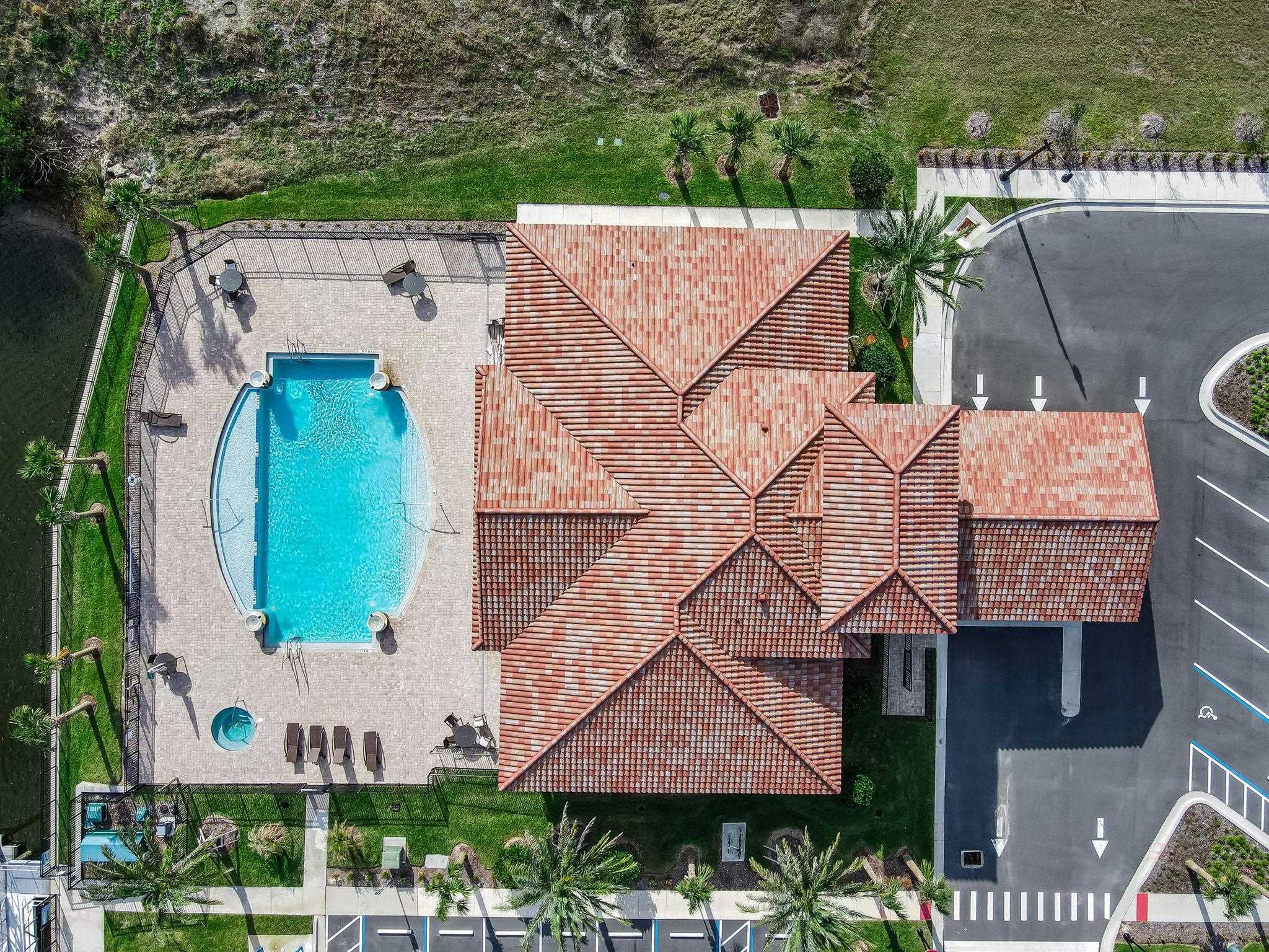 18 Rio Vista Drive Palm Coast, FL 32137 - Photo 56 of 73 an aerial view of a house with a garden and plants