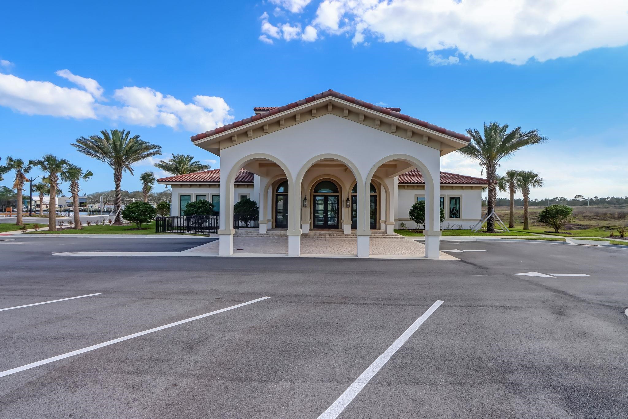 18 Rio Vista Drive Palm Coast, FL 32137 - Photo 59 of 73 a view of a white house with a street