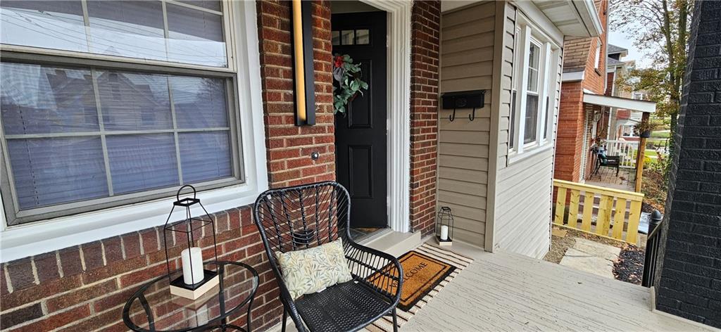 2344 Saranac Avenue Pittsburgh, PA 15216 - Photo 15 of 48 a view of a balcony with a door and a window