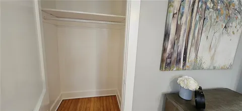 a view of a livingroom with furniture and windows