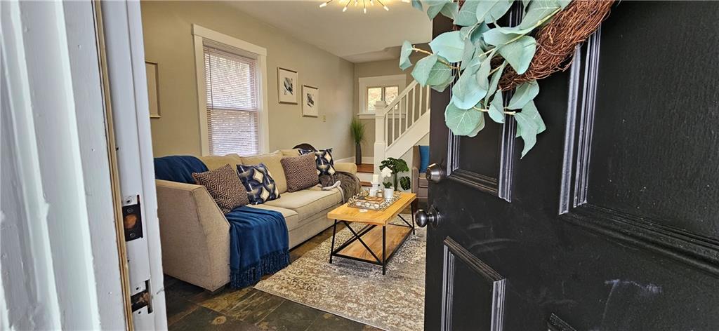 2344 Saranac Avenue Pittsburgh, PA 15216 - Photo 3 of 48 a living room with furniture and a potted plant