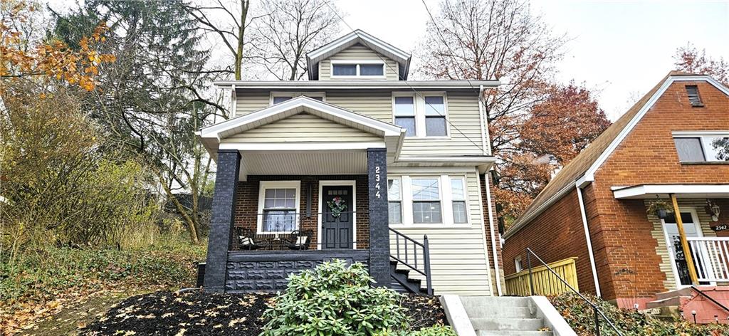 2344 Saranac Avenue Pittsburgh, PA 15216 - Photo 48 of 48 a front view of a house with garden