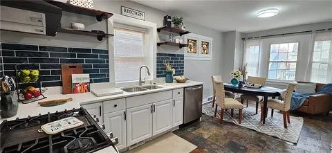 a room with gym equipment and window