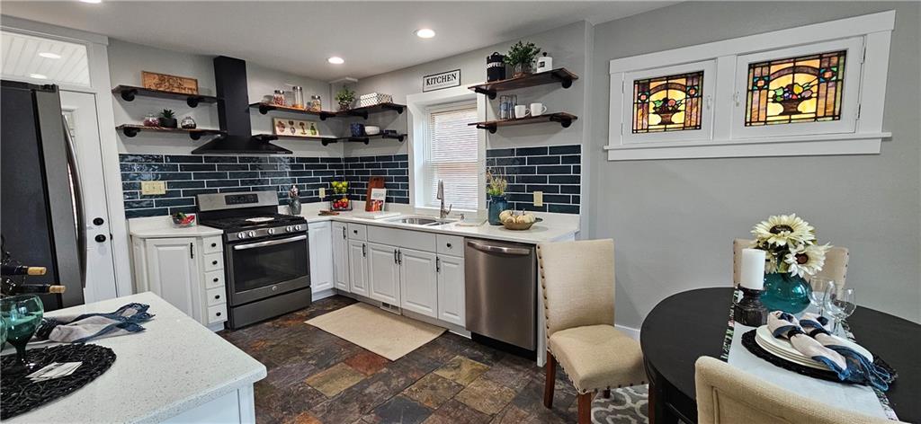 2344 Saranac Avenue Pittsburgh, PA 15216 - Photo 6 of 48 a kitchen with a sink cabinets and appliances