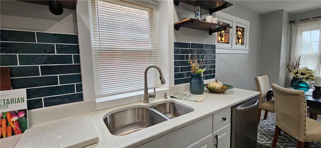 2344 Saranac Avenue Pittsburgh, PA 15216 - Photo 9 of 48 a kitchen with a sink and a refrigerator