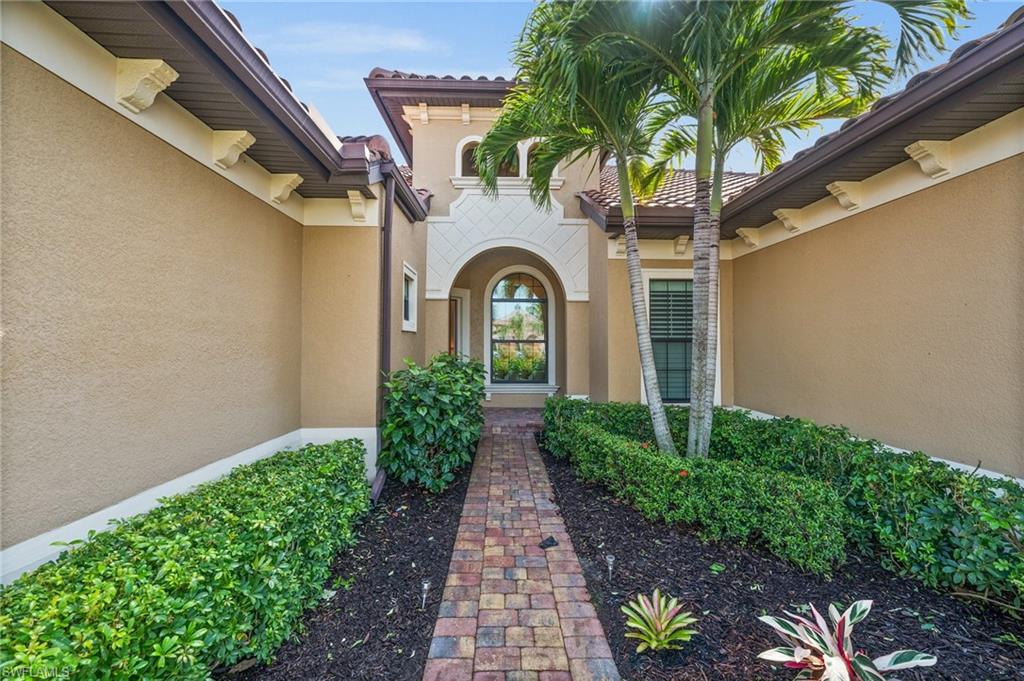6608 Roma Way Naples, FL 34113 - Photo 27 of 50 View of property entrance