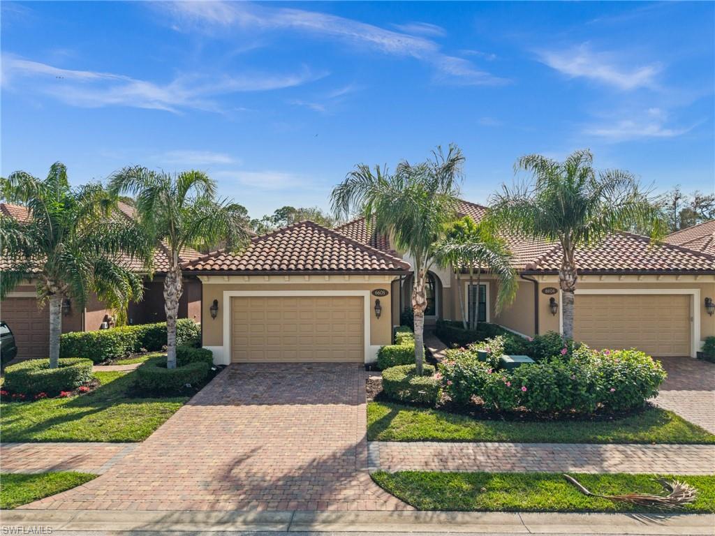 6608 Roma Way Naples, FL 34113 - Photo 34 of 50 Mediterranean / spanish house with a garage
