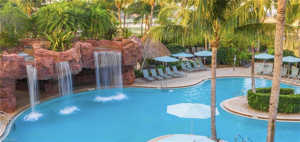 6608 Roma Way Naples, FL 34113 - Photo 43 of 50 View of swimming pool featuring pool water feature