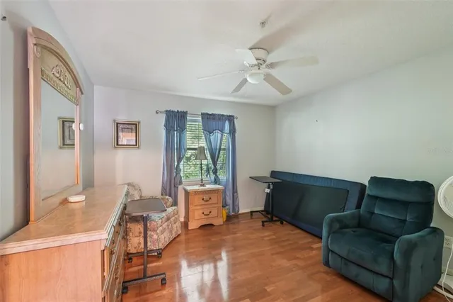 a living room with furniture and a window
