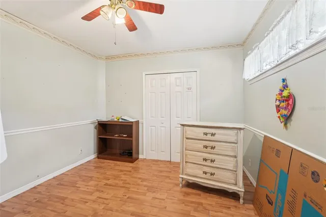a bathroom with a sink mirror and vanity