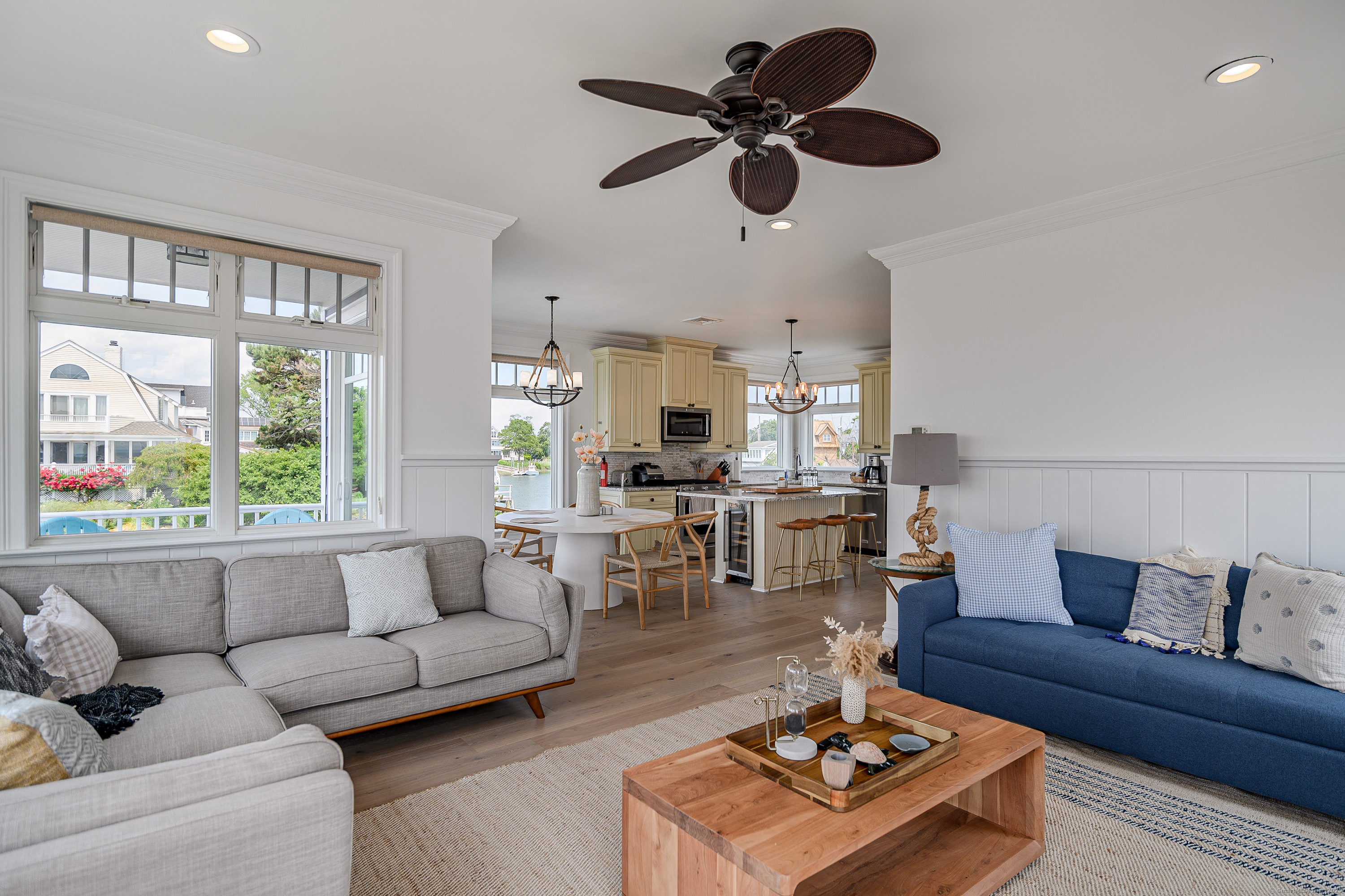 2154 Fairfield Beach Road Fairfield, CT 06824 - Photo 15 of 39 a living room with furniture and a large window