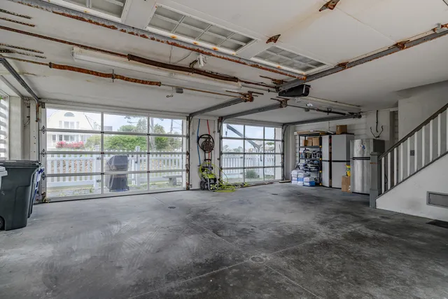 a view of an empty room with a fireplace