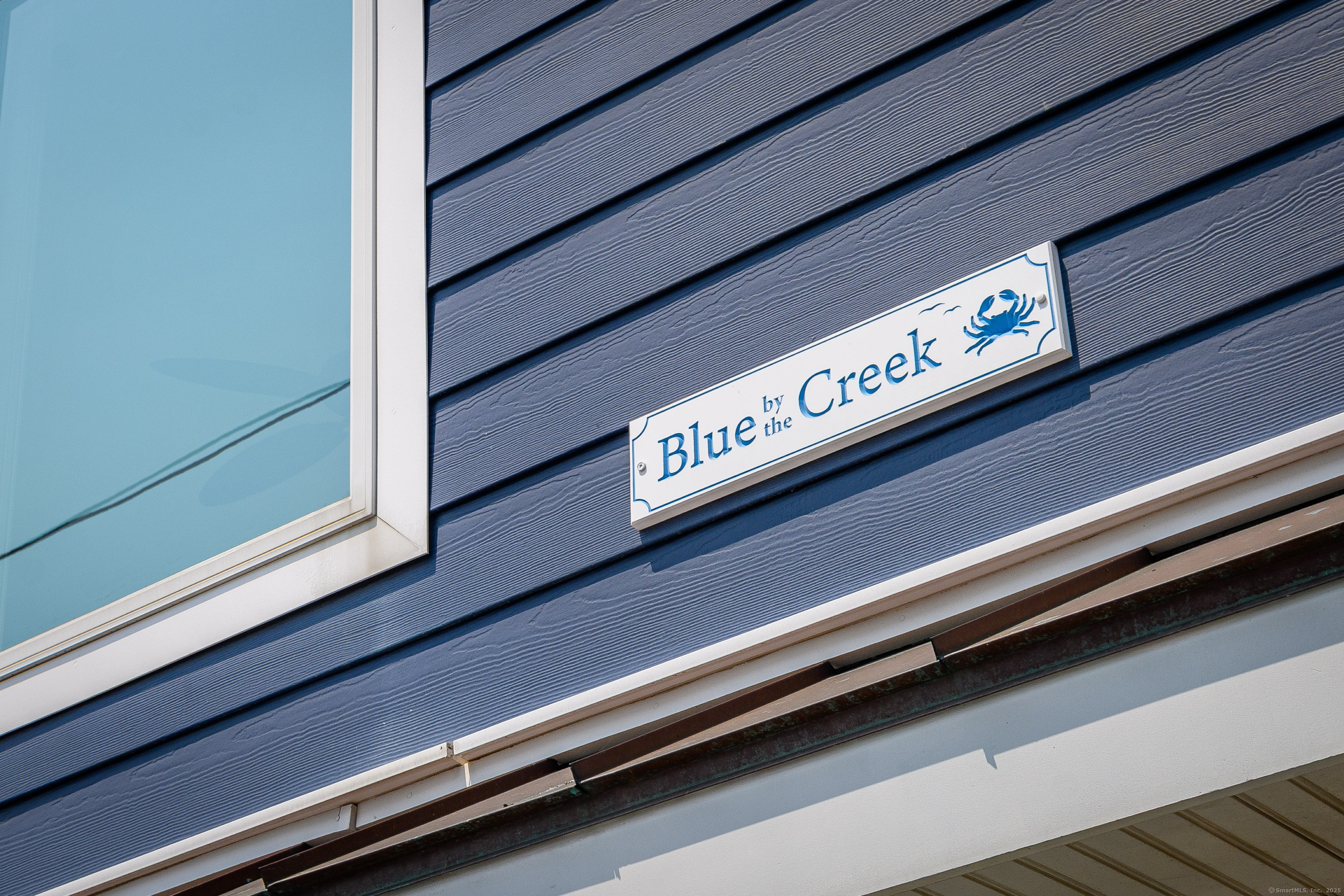 2154 Fairfield Beach Road Fairfield, CT 06824 - Photo 3 of 39 a close view of car