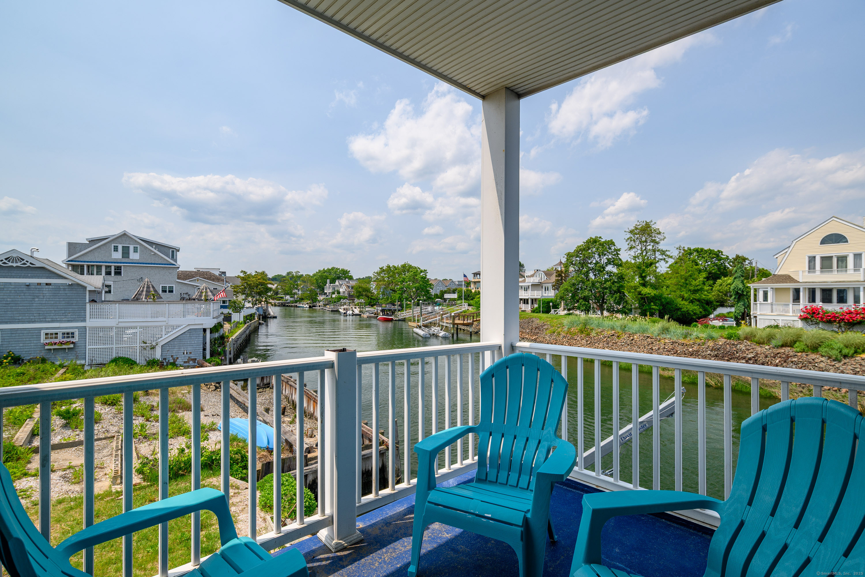 2154 Fairfield Beach Road Fairfield, CT 06824 - Photo 33 of 39 a view of a city from a balcony
