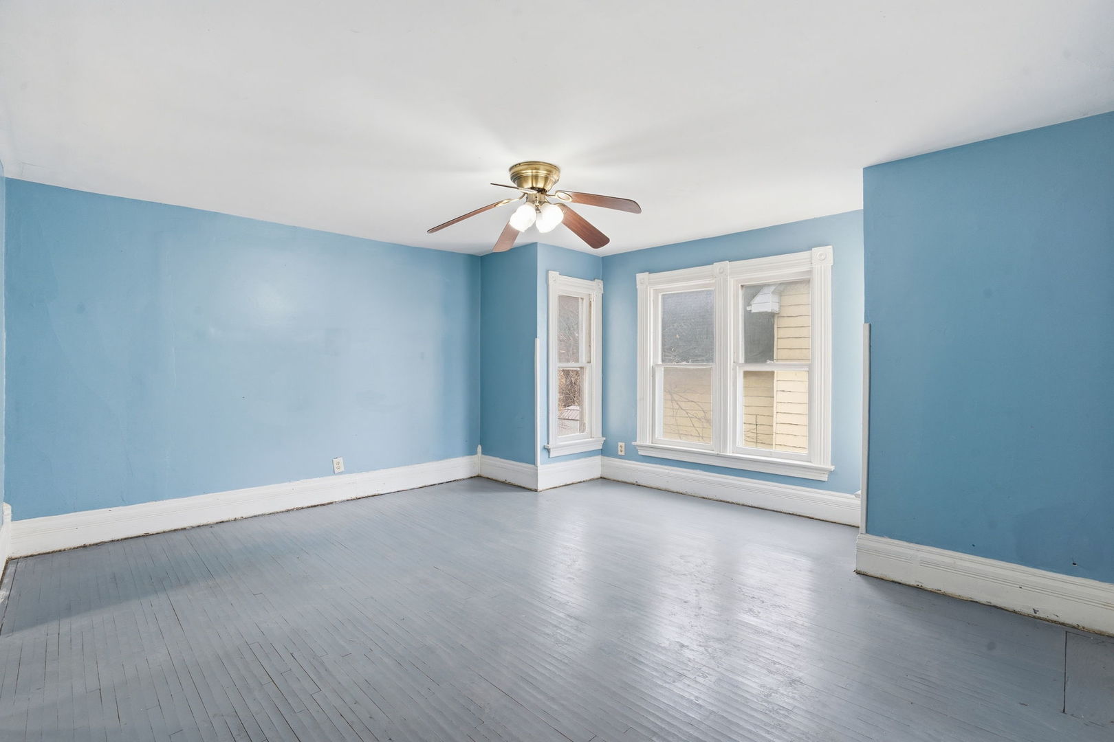903 44th Street Rock Island, IL 61201 - Photo 12 of 28 a view of an empty room with a window