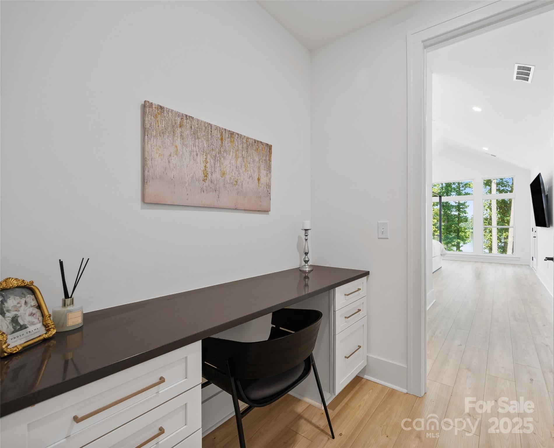 1075 Retreat Way Ridgeway, SC 29130 - Photo 14 of 48 a view of a workspace with furniture and a potted plant