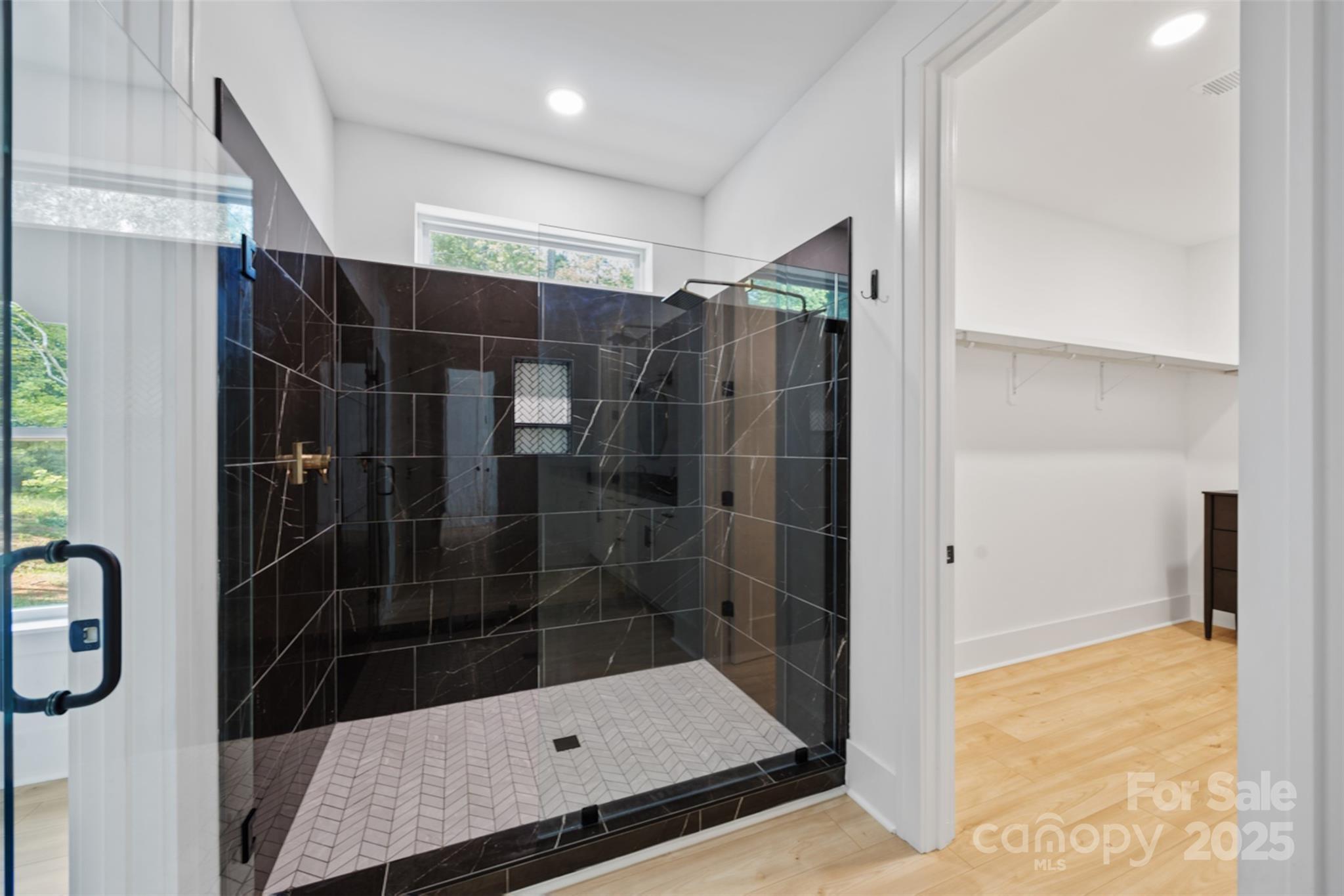 1075 Retreat Way Ridgeway, SC 29130 - Photo 18 of 48 a bathroom with a shower and a sink