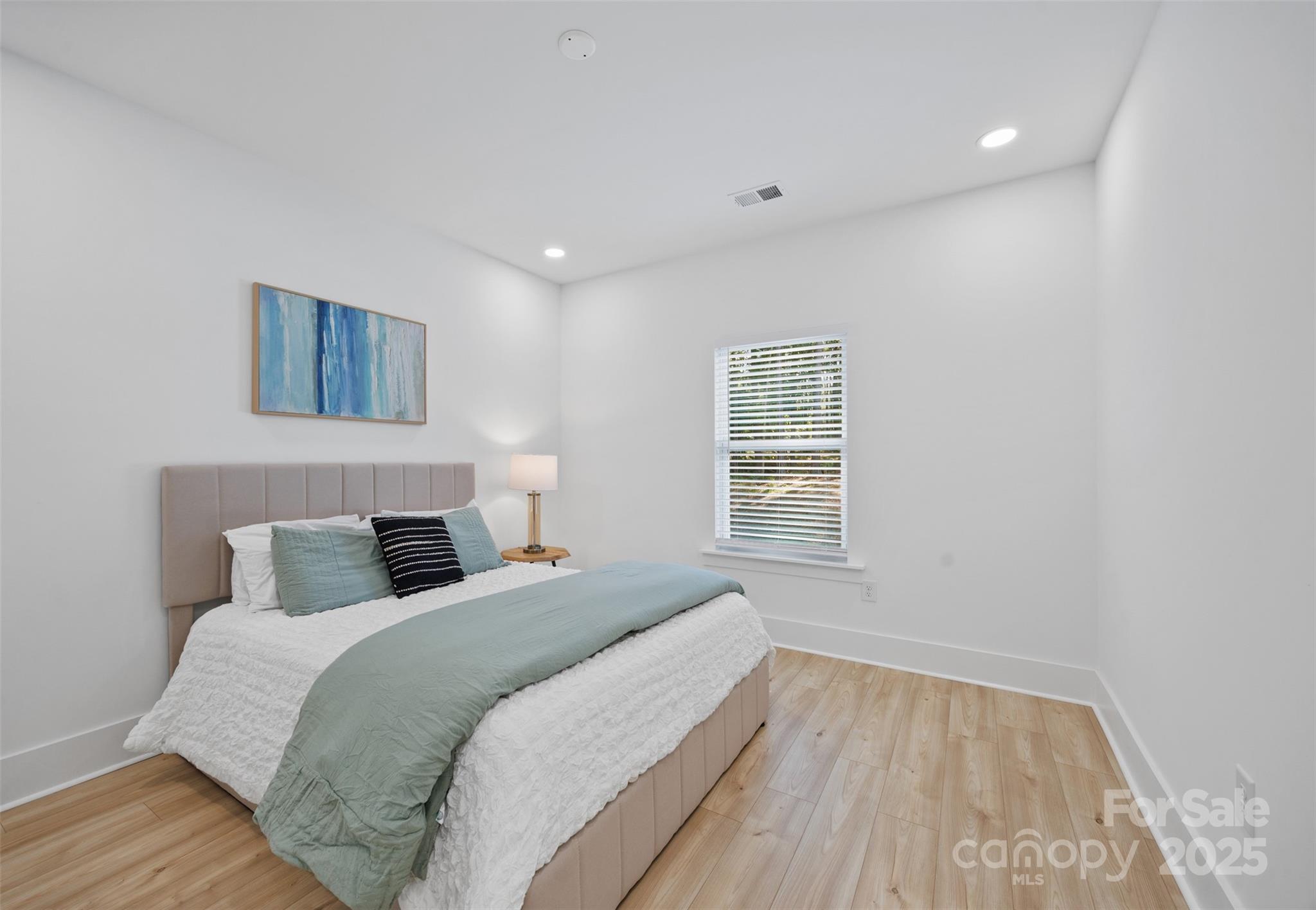 1075 Retreat Way Ridgeway, SC 29130 - Photo 23 of 48 a bedroom with a bed and a window