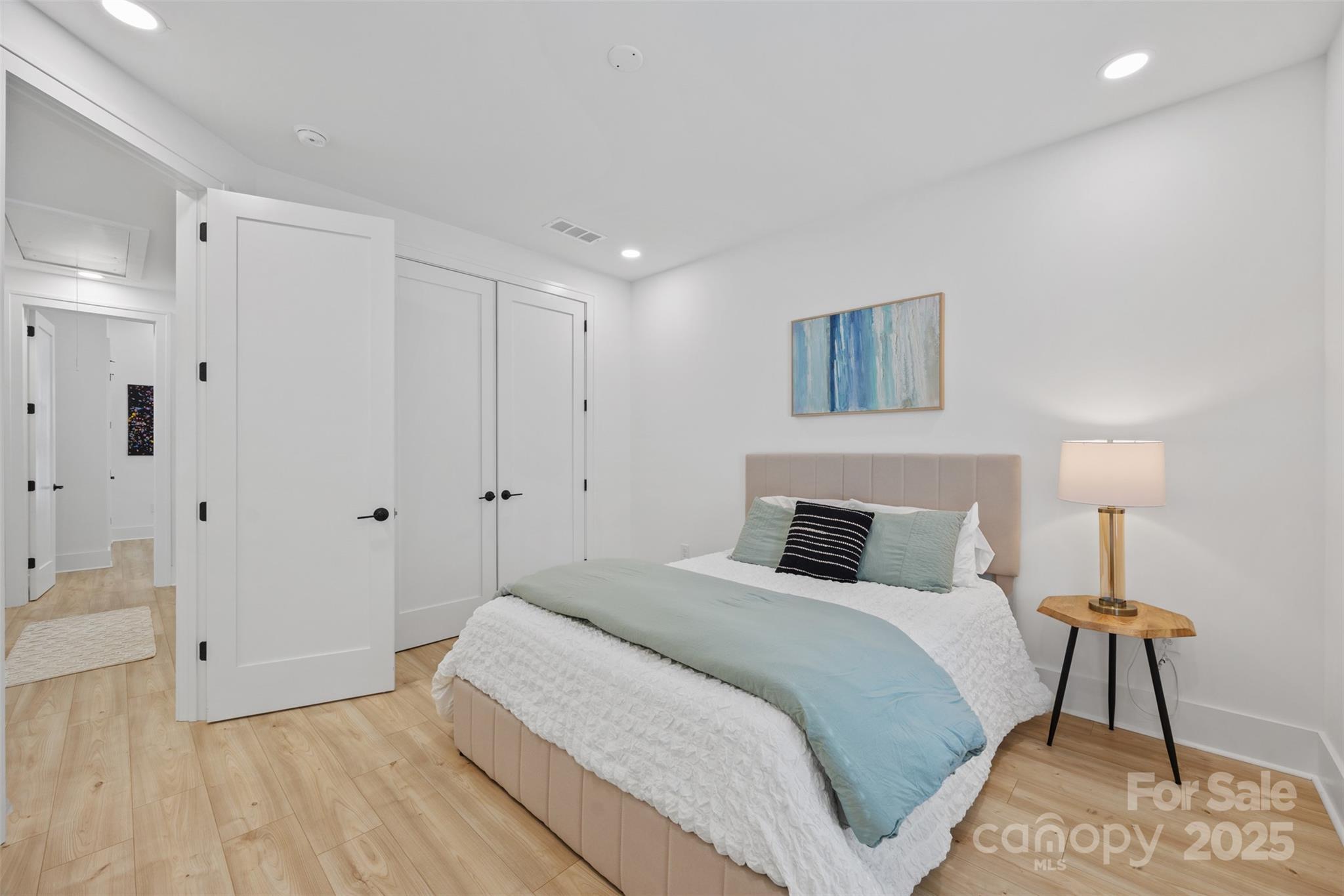 1075 Retreat Way Ridgeway, SC 29130 - Photo 24 of 48 a bedroom with a bed and a night stand