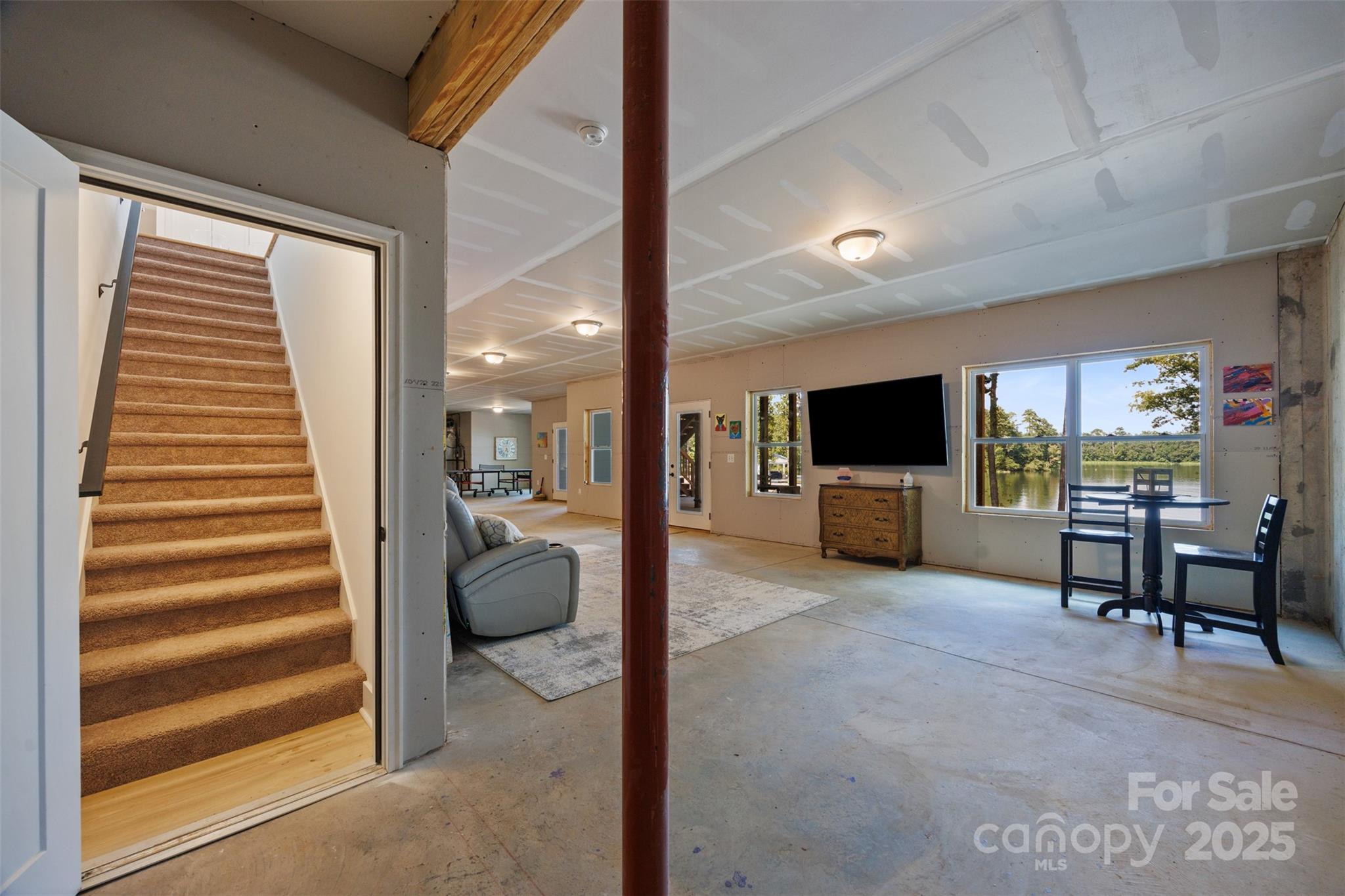 1075 Retreat Way Ridgeway, SC 29130 - Photo 27 of 48 a view of a livingroom with furniture and a window