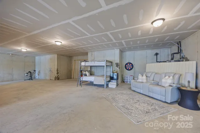 a living room with furniture and a table