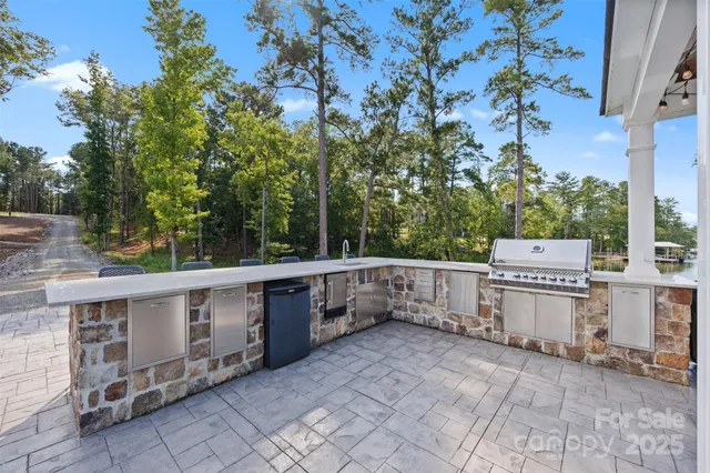 a view of a kitchen with furniture and trees