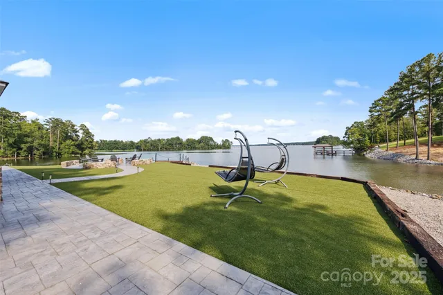 a swimming pool with wooden fence