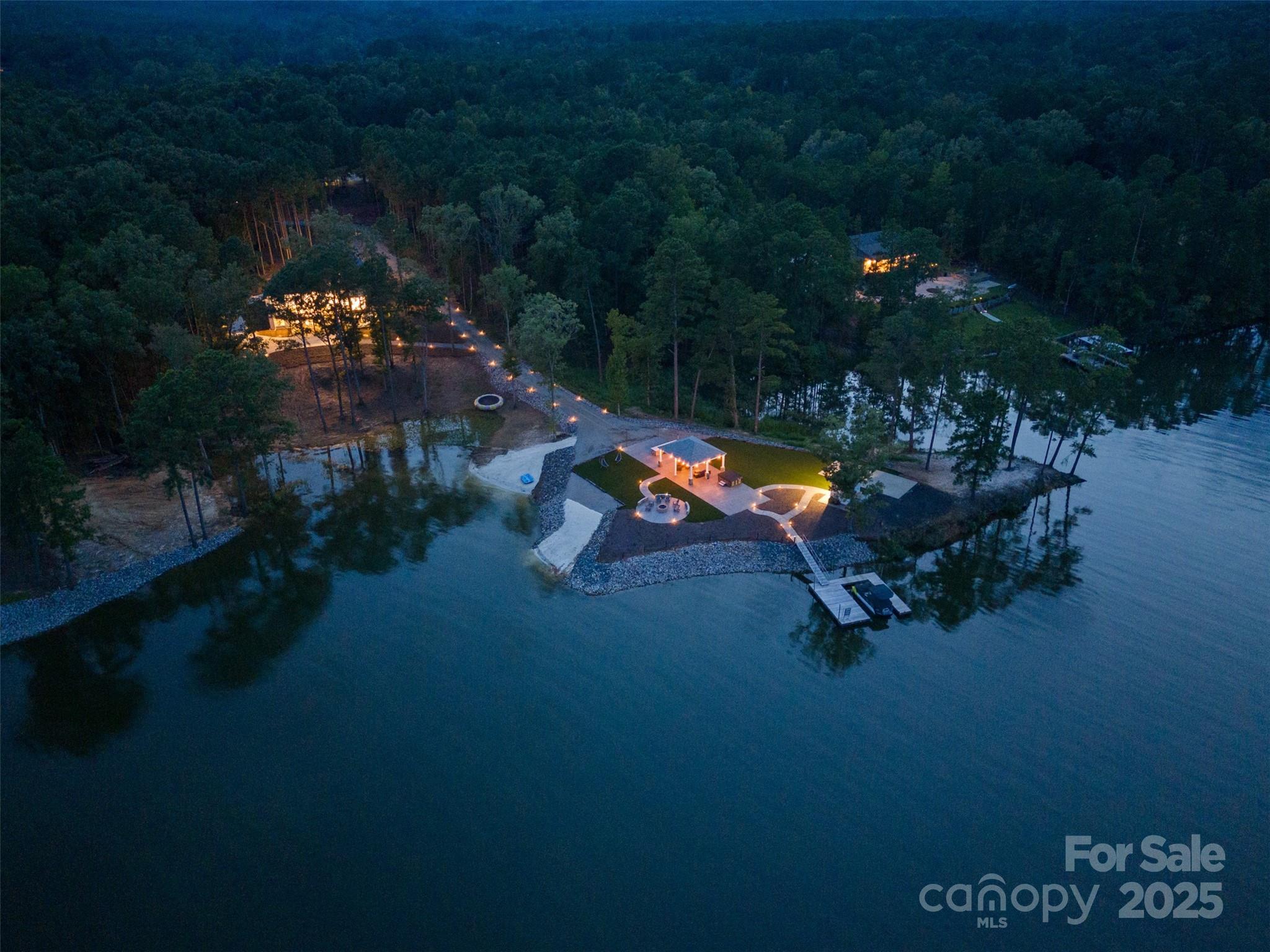 1075 Retreat Way Ridgeway, SC 29130 - Photo 4 of 48 an outdoor space with swimming pool fire pit and outdoor seating